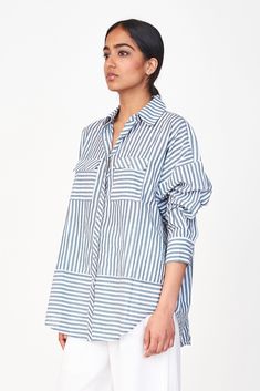 Oversized blouse with front button placket Gathered at back yoke Full length sleeves tapered at cuff with button closure Patch pockets on chest with button flaps Semi sheer 100% cotton Made in India 100% Cotton Clothing, Stripe Shirt, Striped Cotton Button-up Shirt, Oversized Striped Shirt With Button Closure, Striped Button-up Blouse With Button Cuffs, Striped Relaxed Fit Button-up Blouse, Striped Button-up Blouse With Placket, Oversized Shirt Outfit, Handloom Fabric