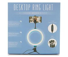 an electronic ring light is shown in the box with instructions on how to use it