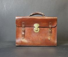 Luxury antique bridle leather chestnut brown briefcase A beautiful tailored solid leather quality briefcase True quality which will cost a fortune to buy new today A superb luxury leather piece measures 41 x 31 cm Luxury Designer Textured Leather Briefcase, Luxury Oiled Leather Briefcase, High-end Luxury Cognac Briefcase, Formal Brown Bridle Leather Briefcase, Rectangular Vintage Brown Briefcase For Formal Occasions, Vintage Brown Rectangular Briefcase For Formal Use, Vintage Brown Rectangular Briefcase For Formal Occasions, Rectangular Brown Briefcase With Brass Hardware, Brown Rectangular Briefcase With Brass Hardware