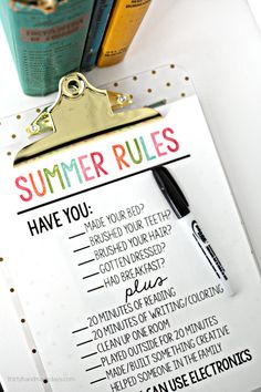 a clipboard with some writing on it that says summer rules next to a cup of coffee