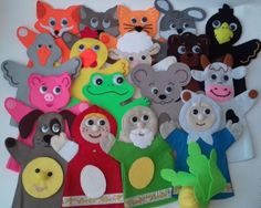 there are many felt animals on the table