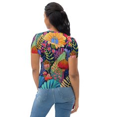 Get to know your new favorite tee—it's super smooth, super comfortable, and made from a cotton touch polyester jersey that won't fade after washing, now offering FREE SHIPPING to the US, Canada, EU, and UK! The artwork This artwork is a vivid and richly detailed depiction of a variety of African flowers, showcasing a tapestry of vibrant colors and intricate patterns. The piece features a dynamic assortment of floral elements, including large, bold blossoms and delicate foliage, all set against a Fitted T-shirt With Sublimation Print For Summer, Trendy Multicolor All Over Print T-shirt, Trendy Multicolor All-over Print T-shirt, Multicolor Crew Neck T-shirt With Plant Print, Fitted Multicolor T-shirt With Sublimation Print, Summer Crew Neck Sublimation Design With All Over Print, Fitted Cotton T-shirt With All Over Print, Trendy Relaxed Fit T-shirt With All Over Print, Summer Multicolor Graphic Tee With Sublimation Design