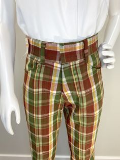 "These are so fun! Great color and pattern, flares and they are new deadstock, never been worn, with tags! Boys plaid denim from the 1960s or 1970s but depending on your size could work for a petite adult as well. Check out the measurements. Great slight flare to the leg. The wide plaid is a dark hunter/olive green, red, yellow and white. Hip and back pockets. Metal zipper. Wide waistband with belt loops. Label (in pants center back): Put-On Shop Sears Perma-Prest Waist 26 Inseam 29 Machine Wash Plaid Jeans, Dark Hunter, Millinery Supplies, Hat Blocks, Boys Plaid, Hat Stands, Yellow Plaid, Red Green Yellow, Metal Zipper