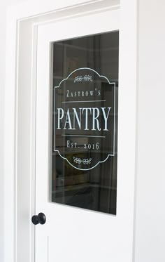 the pantry sign is on the glass door