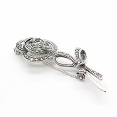 925 Sterling Silver Vintage Real Marcasite Gem Floral Pin Brooch Weight: 10.0g WELCOME TO PAWN SHOP We are an actual pawn shop and have been in business for over 25 years. Since 1990, our establishment has been serving a variety of clients by providing them with short term cash solutions and options of liquidity regarding their treasured heirlooms. Acknowledging that today′s customers are very sophisticated and are looking for a variety of investments, our acquisitions are hand-picked for our sp Hallmarked Sterling Silver Brooches For Anniversary, Sterling Silver Hallmarked Brooches For Anniversary, Sterling Silver Brooches For Anniversary, Elegant Silver Pins For Jewelry Making, Vintage Sterling Silver White Gold Brooches, Classic Sterling Silver Brooch, Vintage White Gold Sterling Silver Brooches, Vintage Sterling Silver Brooch For Wedding, Vintage Sterling Silver Brooches For Wedding