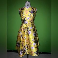 Beautiful Spring Floral Print Fit And Flare Sleeveless Dress New Yellow Floral Print Sleeveless Party Dress, Elegant Yellow Sleeveless Maxi Dress, Yellow Sleeveless Dress For Garden Party, Black Halter Mini Dress, High Low Dress Formal, Tiered Ruffle Mini Dress, Spring Floral Prints, Red Striped Dress, Womens Sheath Dress