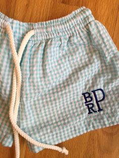 Get ready for summer early! Adorable swim trunks with monogram included.  Please contact me to ask about color/size availability before ordering Include in note to seller: -size (12m, 18m, 2T, 3T, 4T, 5T, 6) -monogram (first, middle, last) -thread color (if none specified, will use navy as pictured) Want rush processing added to your order?  Don't forget to also add the rush processing item to your cart! https://www.etsy.com/listing/286107687/rush-processing-fee-5-dollars Summer Short Swim Trunks For Playwear, Summer Style Short Swim Trunks For Play, Cotton Swimwear For Summer Activities, White Swim Trunks For Summer, White Beachwear Swim Trunks For Play, Summer Cotton Swim Trunks For Playwear, Cotton Swim Trunks For Summer Playwear, Boy Monogram, 5 Dollars