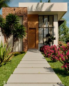 a house that is in the grass with flowers