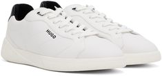 Low-top buffed faux-leather sneakers in white. · Lace-up closure · Logo flag at padded tongue · Padded collar · Logo embossed at outer sides and heel tab · Terry cloth lining · Crepe rubber sole Supplier color: White White Casual Skate Shoes With Embossed Logo, Casual White High-top Sneakers With Embossed Logo, White Leather Skate Shoes With Embossed Logo, Leather Lace-up Skate Shoes With Embossed Logo, Mid-top Leather Sneakers With Embossed Logo, Low-top Sneakers With White Sole And Logo Detail, Off White Low-top Sneakers With Vulcanized Sole, White Leather Sneakers With Fade-resistant Material, Print Sneakers