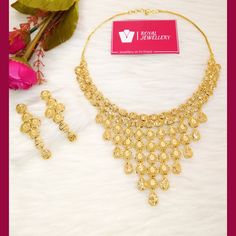 24 carat gold plated Kuwaiti necklace set with earrings. A best replica of original gold sets. 100% real look. Perfect for any occasion. More variety on our shop. For any enquiries feel free to contact us. Please provide detailed address with contact number when order is placed as it is required on shipping label. Yellow Gold Plated Chandbali Necklace, Gold Chandbali Filigree Jewelry Sets, Gold-plated Temple Necklace With Elegant Design, Gold Hallmarked Chandbali Jewelry, Gold Hallmarked Kundan Necklace For Diwali, Gold-plated Chandbali Jewelry, Yellow Gold Plated Kundan Necklace For Diwali, Gold Plated Kundan Necklace For Diwali, Gold Chandbali Bridal Necklace With Hallmark