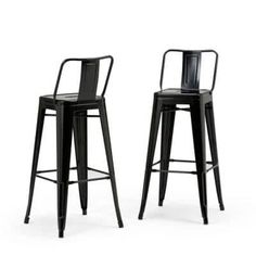 two black metal stools with arms and backrests, one on each side