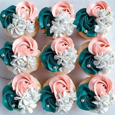 there are many cupcakes with flowers on them