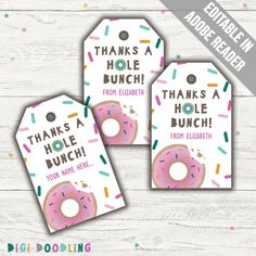 two pink donuts with sprinkles on them and thank you for lunch tags