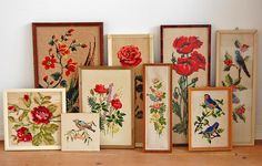 there are many framed pictures with flowers on them