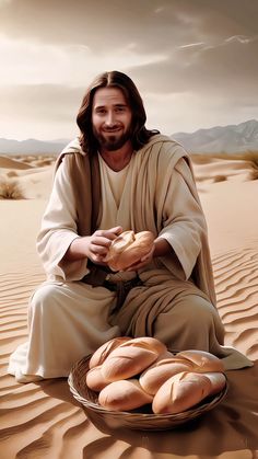 a man sitting in the desert with bread