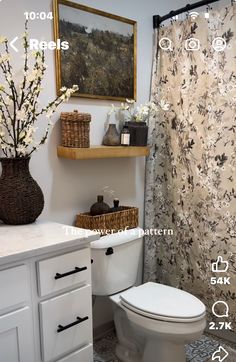 a bathroom with a toilet, sink and shower curtain in it's measurements on the wall