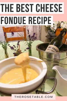 the best cheese fondue recipe in a bowl with a bottle of wine on the side