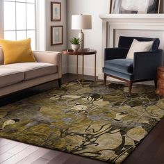 a living room with a couch, chair and rug on the floor in front of a fire place