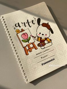 a notebook with an image of a cartoon character on it