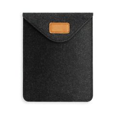 a black case with a brown leather tag on the front and back side of it