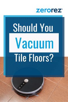 a blue sign with the words should you vacuum tile floors? on top of it