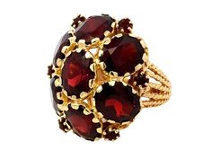 Ring Specifications:Metal: 14k Yellow GoldTotal Weight: 14.9 GramsGemstone: Red GarnetGarnet Carat Weight: ~21 caratsRing Size: 5.5 (resizable)Ring Measurements: 1" x 1"Stamped: "14K"Condition: Preowned, excellent100% Authentic. Please ask all questions before bidding or making a best offer. International Bidders please contact us before bidding for shipping availability and charges. Heirloom Red Oval Cluster Ring, Red Cluster Ring For Formal Occasions, Red Oval Garnet Cluster Ring, Oval Red Garnet Cluster Ring, Formal Oval Flower Ring In Fine Jewelry Style, Red Gemstone Flower Ring For Formal Occasions, Oval Flower Ring For Formal Events, Formal Red Gemstone Flower Ring, Formal Red Cluster Ring