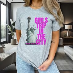 Pack your bags and make memories to your next adventure with this unique girls trip to NYC group matching tshirt!  -These are Unisex t-shirts. Size down for a more fitted look.  -Size up if you prefer an oversized look. -Perfect gift for any occasion, or a just because gift. -Orders with multiple items may arrive separate. -We hope you fall in love with one of our products and decide to own one.  -Feel free to contact us if you have any questions, we will be happy to help you. -Returns are not accepted since all items are made to order; however, if your item arrives  damaged or defective, message me so I can make it right for you.  -100% Airlume combed and ringspun cotton  -Care instructions: Non-chlorine: bleach as needed; Tumble dry: low heat; Iron, steam or dry: medium heat; Machine was Short Sleeve Tops With Letter Print For Travel, Graphic Tee With Letter Print For Travel, Nyc Shirt, Matching Pjs, Disney Trip Shirts, New York Vacation, Friends Tshirt, Just Because Gifts, Vacation Shirts