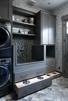 a washer and dryer in a small room