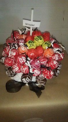 a bouquet of candy wrapped in brown paper