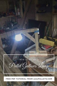 a lamp that is sitting on top of a wooden table with the words how to diy your pallet galvanis lamp