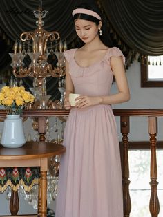 Get ready to twirl and dance in our Ema Mauve Balletcore Aesthetic Coquette Dress! With its delicate dark dusty-rose hue, A-line silhouette, ruffled neckline with elasticated shoulders and a comfortably fitted back with shirring, this ethereal dress will have you feeling like a graceful ballerina. Get inspired and express yourself through graceful movements in this feminine ethereal dress! Size S Bust: 78-84cm Waist: 60-66cm Length: 112cm Size M Bust: 82-88cm Waist: 64-70cm Length: 113cm Size L Pink Dress Coquette, Dusty Pink Outfit, Dusty Pink Outfits, Coquette Dresses, Balletcore Aesthetic, Coquette Dress, Ethereal Dress, Aesthetic Coquette, Dark Feminine