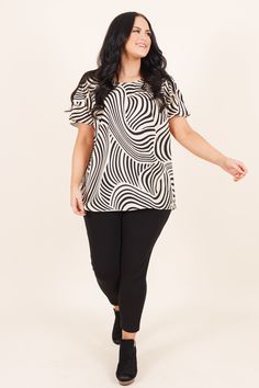 This fierce top adds a fashionable touch to any outfit! Its trendy geometric pattern and delightful neutral colors are perfect for any occasion, from an evening date to an office meeting! You'll look chic all season long! 100% Polyester Trendy Blouse With Geometric Pattern For Spring, Chic Graphic Print Tops, Chic Spring Tops With Geometric Pattern, Chic Graphic Print Blouse For Work, Chic Printed Tops For Night Out, Chic Spring Blouse With Geometric Pattern, Casual Abstract Print Tops For Work, Casual Tops With Abstract Print For Work, Chic Blouse With Graphic Print For Work