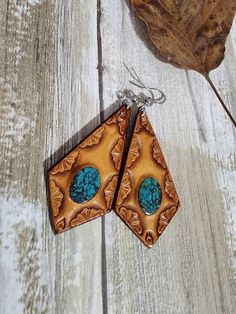 Check out this item in my Etsy shop https://www.etsy.com/listing/1382426117/deep-blue-turquoise-inlay-leather Bohemian Hand-tooled Leather Earrings, Handmade Leather Turquoise Earrings, Handmade Turquoise Leather Earrings, Handmade Leather Earrings In Turquoise, Bohemian Turquoise Leather Earrings, Rustic Hand Tooled Leather Jewelry, Blue Bohemian Hand-tooled Earrings, Southwestern Hand Tooled Leather Jewelry, Southwestern Hand-tooled Leather Jewelry