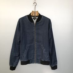 Beautiful vintage Agnès B bomber jacket. Dark blue jean fabric, light gray lining. Black rib knit cuffs and bottom band. A very cool classic piece, a must have! Material is denim made of 93% cotton, 6% polyester and 1% elastane -- Rib knit cuffs and bottom band are 100% cotton Condition is : very very good vintage condition -- probably never worn, the pockets are still sewn Size is men S/M (refer to measurements) Do not hesitate to DM if you have any questions ! shoulder seam to shoulder seam : Winter Streetwear Denim Jacket With Zipper, Streetwear Cotton Outerwear With Contrast Collar, Dark Wash Cotton Outerwear For Streetwear, Casual Cotton Varsity Jacket, Casual Dark Wash Cotton Outerwear, Cotton Outerwear With Contrast Collar For Streetwear, Casual Cotton Outerwear With Contrast Collar, Urban Cotton Varsity Jacket For Spring, Urban Cotton Outerwear In Medium Wash