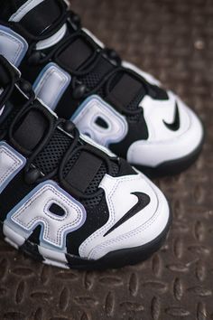 All Sales are Final on Jordan and Nike Products. More than perhaps any other silhouette, the Air More Uptempo encapsulates '90s basketball flavor at its finest. Big and bold, the unapologetic design represents a hybrid of style and innovation that made major waves when it debuted—and still turns heads today. This crafted take keeps it simple and easy to style in classic black and white, while pops of blue add a breath of fresh air. Speaking of air, the graffiti-style AIR graphic (an off-court fa Nike More Uptempo, Nike Uptempo Sneakers, Uptempo Nike White, Nike Uptempo, Nike Air Uptempo Black White, Nike Air More Uptempo Black, Nike Air More Uptempo Sneakers, Nike Air Uptempo Shoes Blue, Nike Air Uptempo