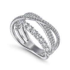 a white gold ring with three rows of diamonds on the sides and an open band