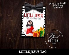 a little jesus book with a bow tie on the front and back cover, sitting on a wooden surface