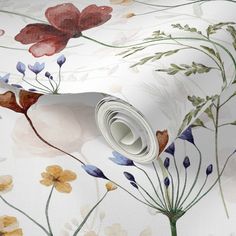 a wallpaper with flowers and leaves on it's white background, including the rolled up paper