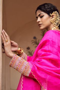 Hot pink straight kurta with beads embroidery. Paired with coordinating scallop edged dupatta and pant. - Aza Fashions Hand Embellished Sharara For Traditional Ceremonies, Hand Embellished Traditional Sharara For Ceremonies, Bollywood Hand Embellished Dupatta For Traditional Ceremonies, Bollywood Style Hand Embellished Lehenga For Traditional Ceremonies, Hand Embellished Bollywood Lehenga For Traditional Ceremonies, Festive Hand Embellished Lehenga For Traditional Ceremonies, Traditional Hand Embellished Dupatta, Embellished Lehenga For Traditional Ceremonies, Bollywood Style Embellished Sets For Traditional Ceremonies