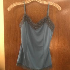 Top Has Built In Self Bra. 100% Polyester. Never Worn And Has Tag. Blue Cami Tank Top For Loungewear, Stretch Blue Camisole For Loungewear, Blue Stretch Camisole For Loungewear, Casual Blue Camisole For Loungewear, Stretch Cotton Blue Camisole, Blue Stretch Cotton Camisole, Blue Fitted Tank Top For Loungewear, Blue Camisole Tank Top For Night Out, Spring Blue Camisole For Loungewear