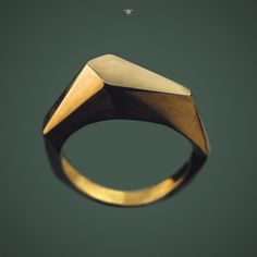 Ursa Minor - Low Polygonal Ring by h i p p i e k o a l a Straight geometric shapes with the highest level of organic comfort . Designed in outer space. Ring size - 16,00 mm (0.630 inches) inside diameter Metal - bronze If you need another size, please contact us. If you don't know your size follow this link: http://www.ringsizes.co/ PROCESSING TIME - takes 1-2 business days + delivery 7-14 business days to Europe, and 7-31 business days to United States and Canada Thank you for visiting our shop Modern Brass Signet Ring, Minimalist Metal Signet Ring As A Gift, Modern Metal Signet Ring, Modern Metal Rings With Unique Design, Modern Jewelry Ring With Unique Design, Modern Ring With Unique Design, Modernist Geometric Rings As Gifts, Modernist Geometric Rings For Gifts, Modernist Geometric Rings For Gift