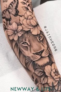 a lion with flowers and butterflies on his arm