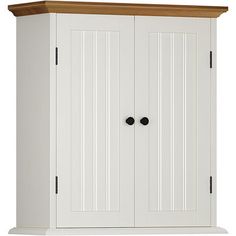 a white cupboard with two black knobs on the top and one brown drawer at the bottom