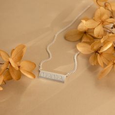 Personalize this bar necklace with any names or words that are special to you in the perfect engraved style. This chic and statement curb chain makes a lasting gift for you or someone special. Material: High Quality Solid 925 Sterling Silver Finish: Sterling Silver ∙ 18K Gold ∙ Rose Gold Dimensions: ~22mm X 7mm (depending on your design) SKU: MM-NM116NIF33 Minimalist Gold Bar Necklace With Name, Minimalist Bar Necklace With Custom Name, Minimalist Custom Name Bar Necklace For Personalized Gift, Custom Name Silver Rectangular Bar Necklace, Minimalist Personalized Rectangular Bar Necklace, Emerald Necklace, Rose Gold Necklace, Silver Rose Gold, Pearl Drop