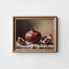 an oil painting of pomegranates on a table