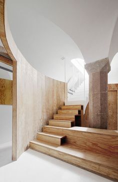 the stairs are made of wood and have been designed to look like it is going down