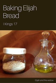 a glass bottle with some liquid in it next to a jar filled with baking bread