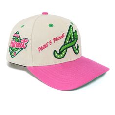 a white and pink baseball cap with the letter a on it