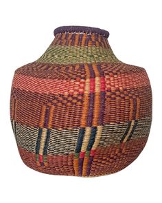 a woven basket with multicolored lines on the bottom and sides, sitting in front of a white background