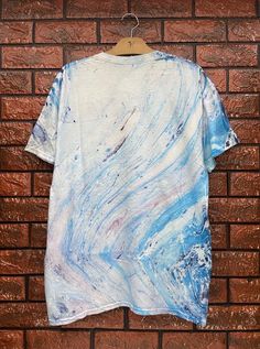 Vintage 90s Tie Dye Marble Art Hippie T Shirt / Skates Surfing T Shirt / 90s Vibe / 90s Streetwear T Shirt Size L Condition : Good Used Size on tag : LColour : Marble art tie dyeBrand : UnknownMeasurement : Armpit to armpit - 21.5”Length - 29.5”Material : CottonMade In: USA THE SHIPPING (Your Choice Please read)1. The shipping cost is USD 20 via Malaysian Registered Postage With Tracking Number.It will take 2-4 weeks or more for delivery, depends on your custom checking.2. Add USD 10 for speedy Blue Graffiti Print T-shirt For Summer, Casual Tie Dye T-shirt With Graffiti Print, Casual Tie-dye T-shirt With Graffiti Print, Casual Short Sleeve T-shirt With Abstract Print, Tie Dye Graffiti Print Crew Neck Top, Tie Dye Crew Neck Top With Graffiti Print, Blue Graffiti Print Crew Neck T-shirt, Cotton Graphic Tee With Abstract Print, Blue Crew Neck T-shirt With Graffiti Print